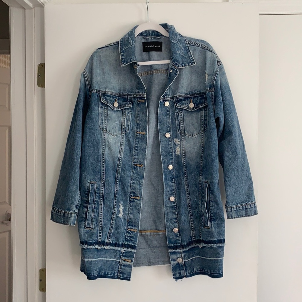 Oversized, longline distressed denim jacket